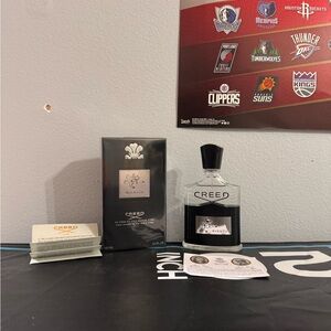Creed Aventus Fragrance with Black and Silver Accents